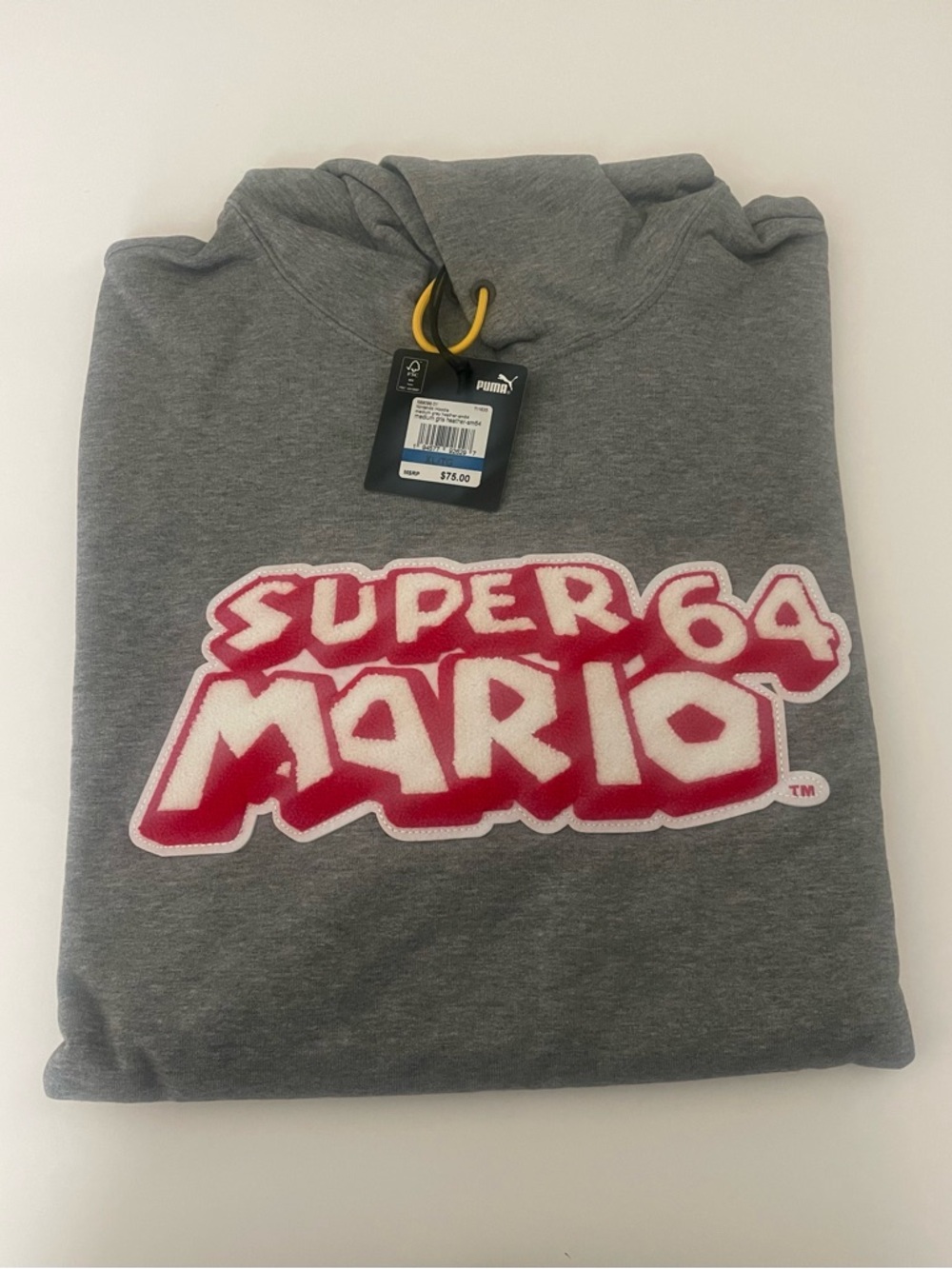 Puma XL Grey Hoodie, with Red and White Super Mario 64 Branding.